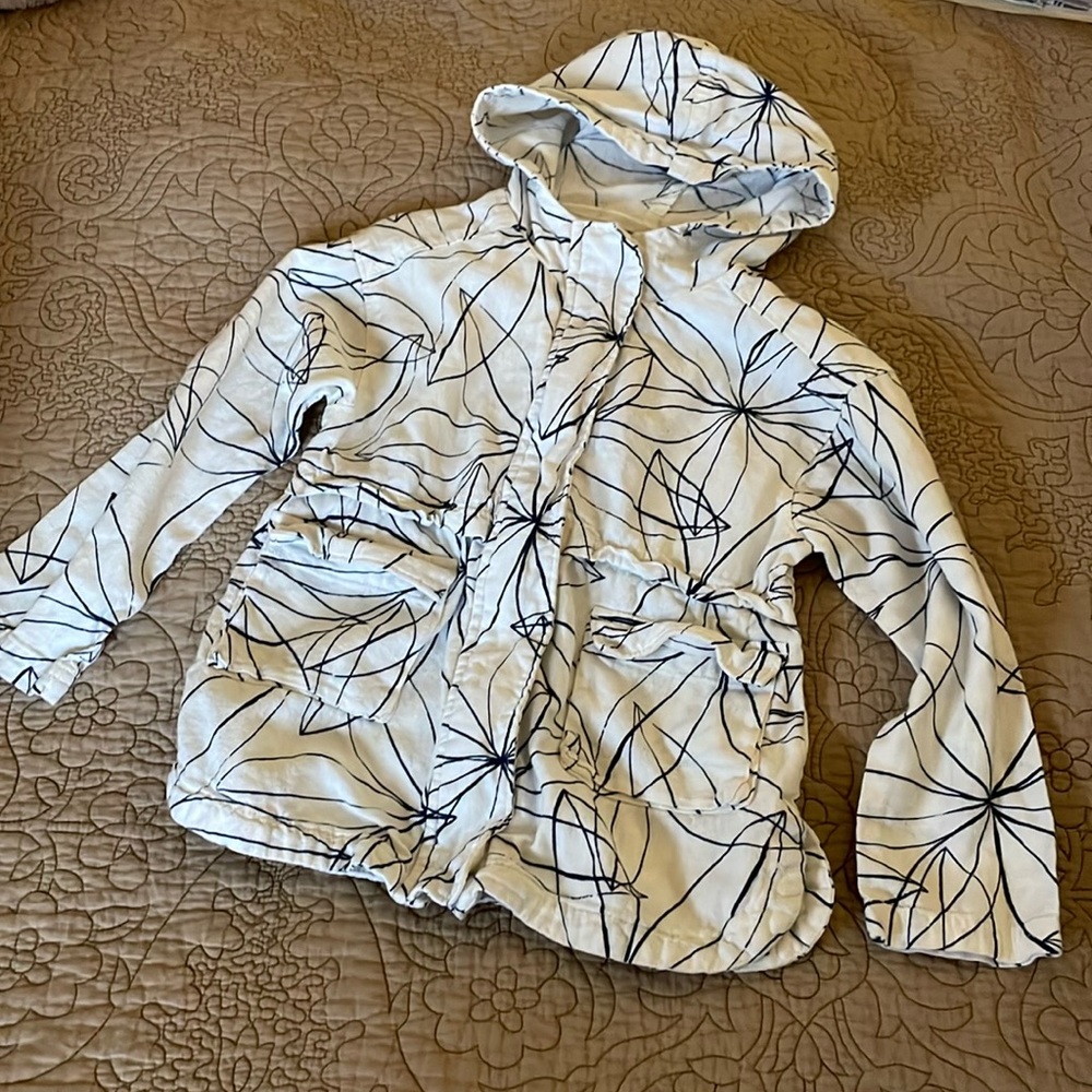 White and blue hooded linen light jacket.